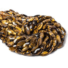 17x10mm Tiger's Eye faceted oval beads 15 inch 22 pieces - Beadsofcambay.com
