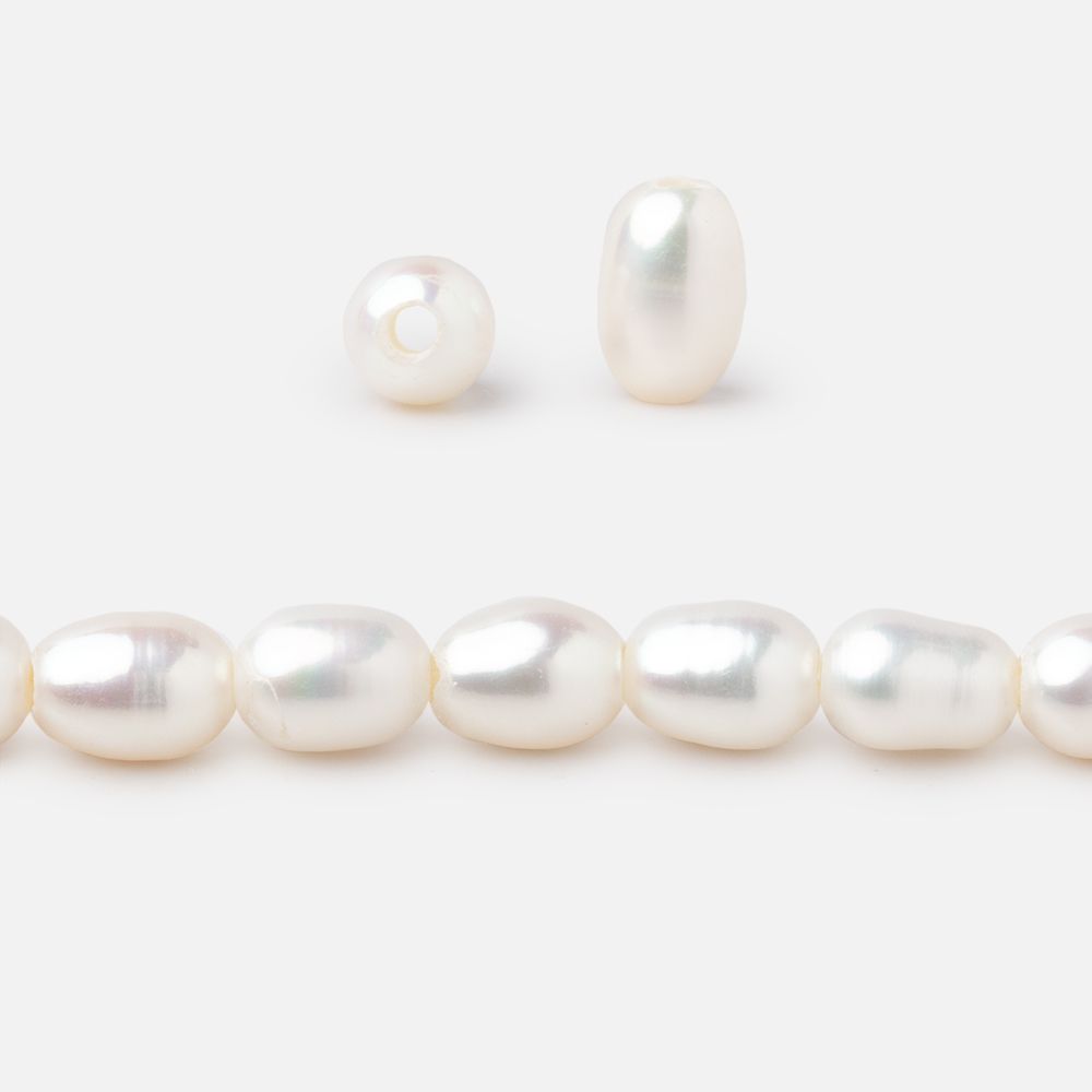 7x5-8x5mm Off White Large Hole Oval Freshwater Pearls 1.5mm drill hole 15 inch 52 pcs - BeadsofCambay.com