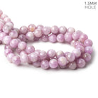 Beadsofcambay 11mm Cat's Eye Kunzite plain rounds 16 inch 37 beads 1.5mm Large Hole AA View 1