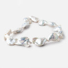 23-33mm Off White Soufflé Baroque Freshwater Pearls 16 inch 13 beads - Beadsofcambay.com