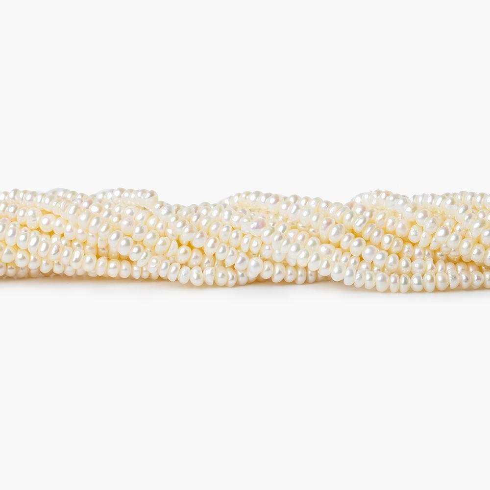 2.5-3mm Off White Center Drilled Button Freshwater Pearl 250 pieces - Beadsofcambay.com