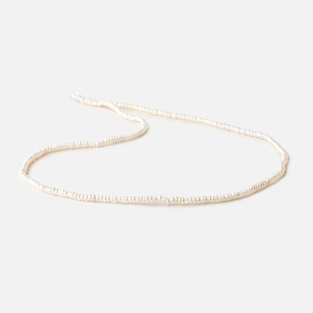 2.5mm Off White Center Drilled Button Freshwater Pearls 15.5 inch 305 pieces - Beadsofcambay.com