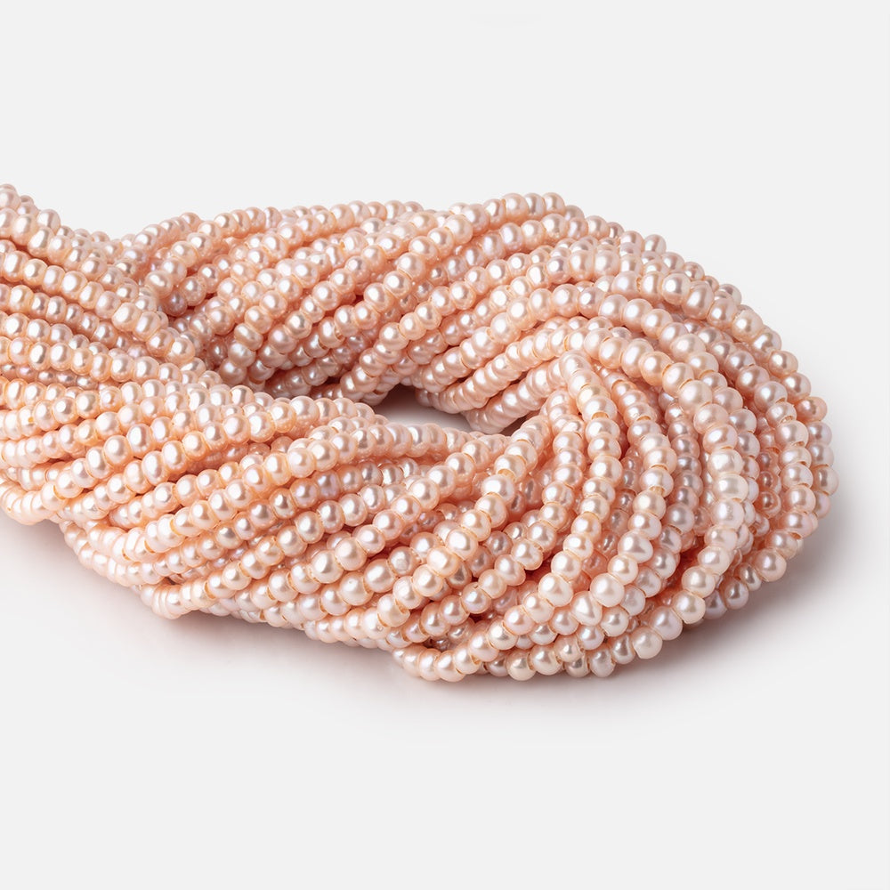 5mm Soft Peach 2.5mm Large Hole Off Round Pearls 15 inch 114 Beads - BeadsofCambay.com