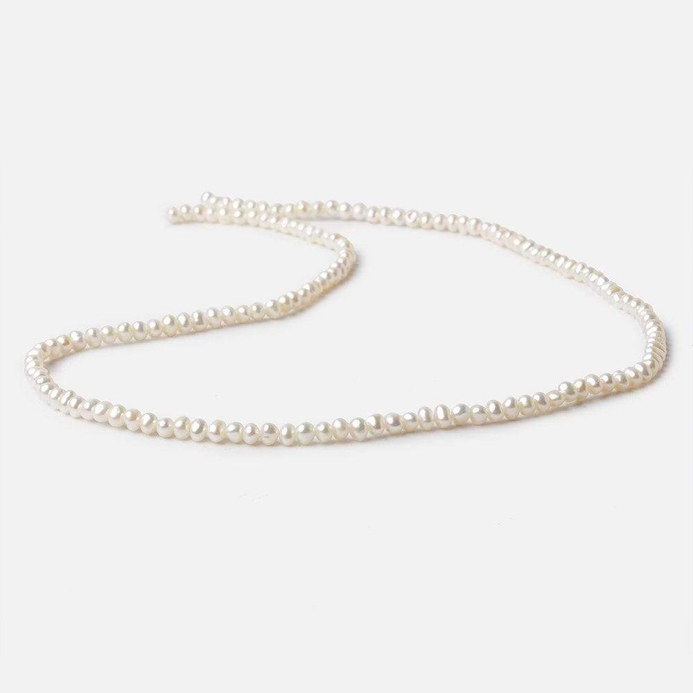 3.5x2.5mm Cream Off Round Freshwater Pearls 140 pcs - Beadsofcambay.com
