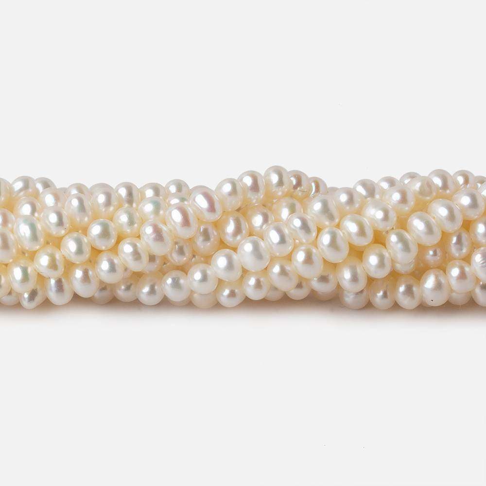 3.5x2.5mm Cream Off Round Freshwater Pearls 140 pcs - Beadsofcambay.com