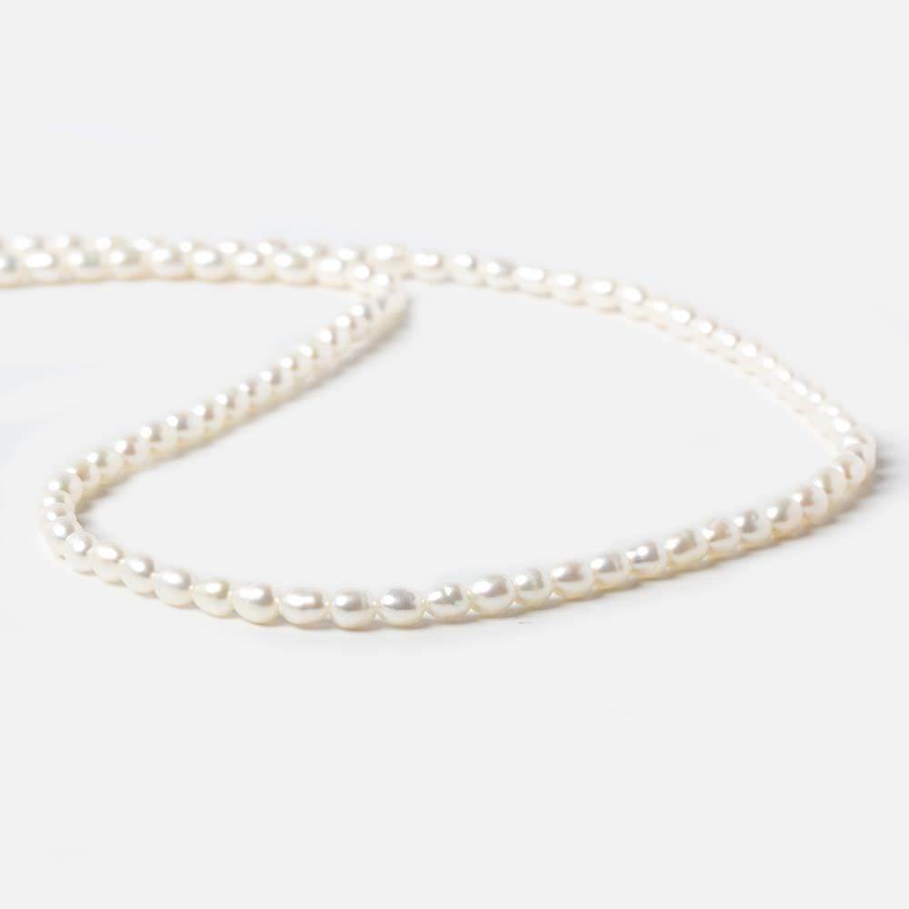 3mm Cream Straight Drilled Oval Freshwater Pearls 16 inch 117 pieces - Beadsofcambay.com