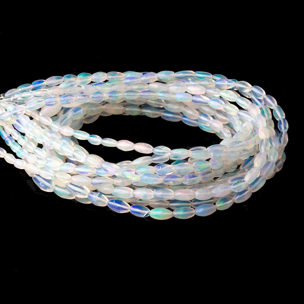 4-9.5mm Ethiopian Opal Plain Rice Beads 18 inch 66 pieces AA - Beadsofcambay.com