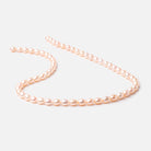 7x5mm Peach Straight Drill Oval Freshwater Pearl 15 inch 56 pcs - BeadsofCambay.com
