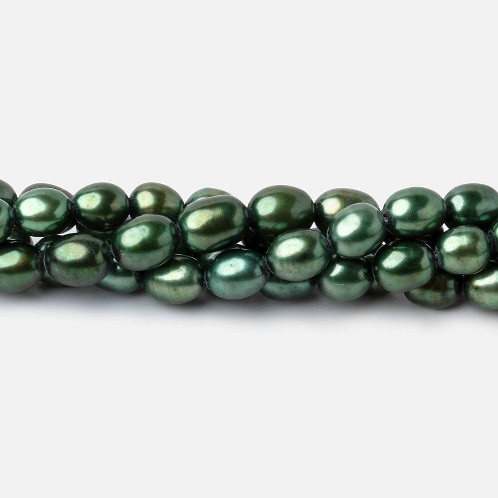 7x5mm Spearmint Green Straight Drilled Oval Pearls 15 inch 63 pieces - BeadsofCambay.com
