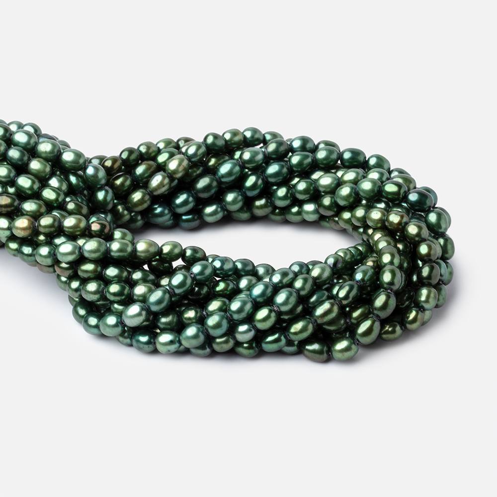 7x5mm Spearmint Green Straight Drilled Oval Pearls 15 inch 63 pieces - BeadsofCambay.com