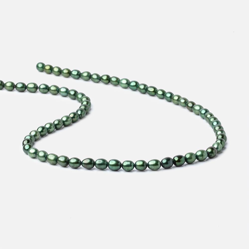 7x5mm Spearmint Green Straight Drilled Oval Pearls 15 inch 63 pieces - BeadsofCambay.com