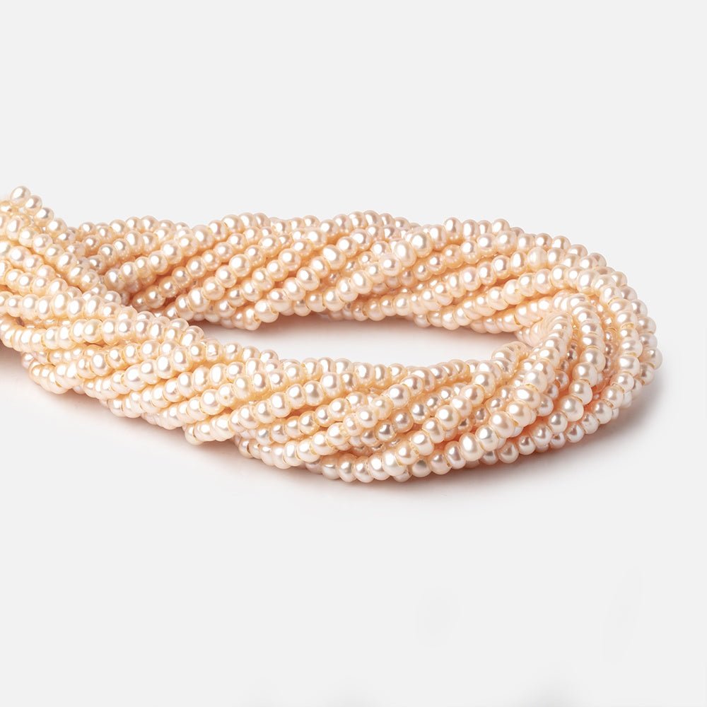 4.5-5mm Peach Off Round Large Hole Freshwater Pearls 15 inch 110 Beads - Beadsofcambay.com