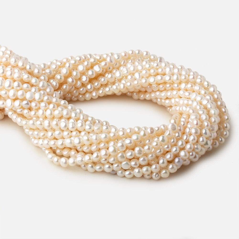 4.5x4-5x4mm Off White side drilled Baroque freshwater pearls 16 inch 90 pieces A - Beadsofcambay.com