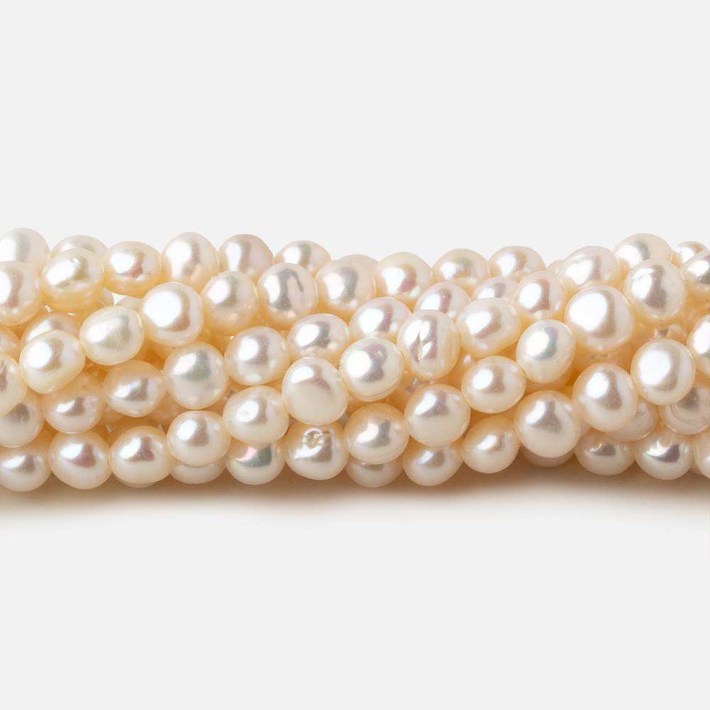 4.5x4-5x4mm Off White side drilled Baroque freshwater pearls 16 inch 90 pieces A - Beadsofcambay.com