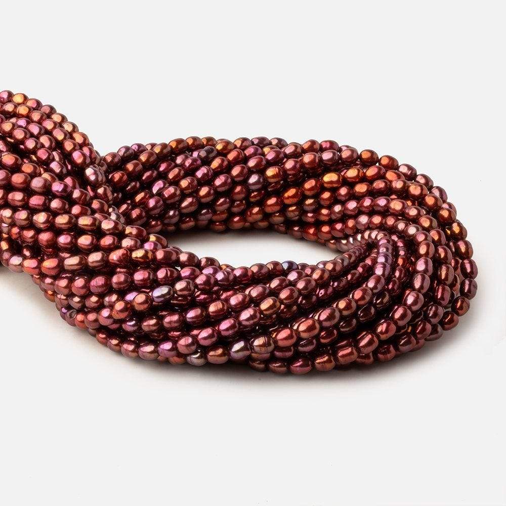 4.5x5-4.5x5.5mm Tri Color Red straight drilled Oval freshwater pearls 15 inch 74 pieces A - Beadsofcambay.com