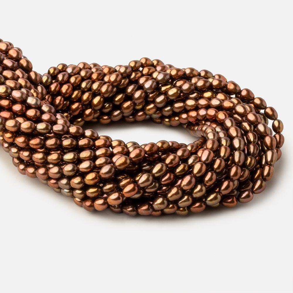 4.5x5.5-5x7mm Tri Color Brown straight drilled Oval freshwater pearls 15 inch 59 pieces A - Beadsofcambay.com