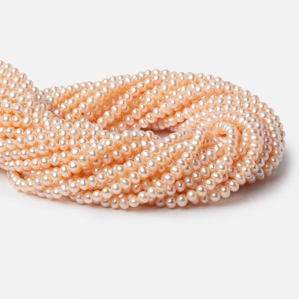4.5x4mm Peach Off Round Freshwater Pearls 15 inch 100 pieces - Beadsofcambay.com