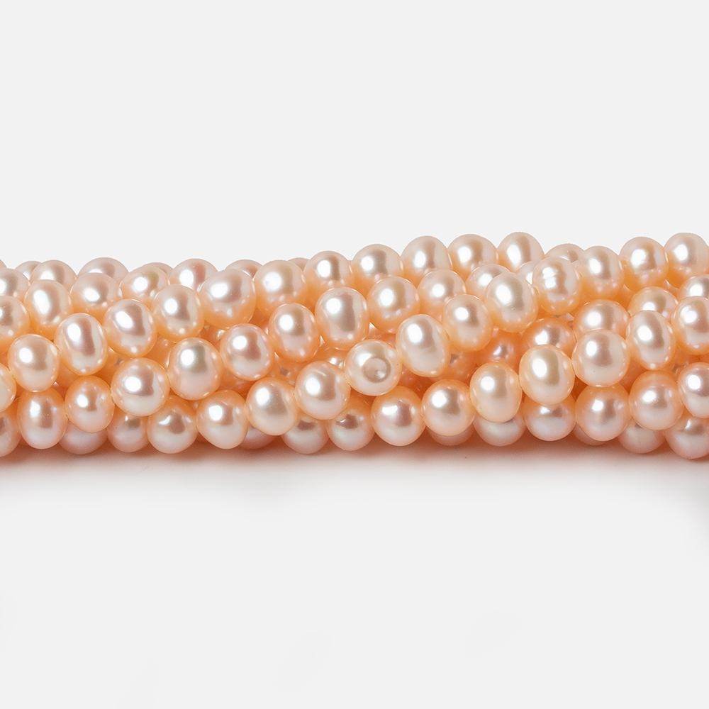4.5x4mm Peach Off Round Freshwater Pearls 15 inch 100 pieces - Beadsofcambay.com