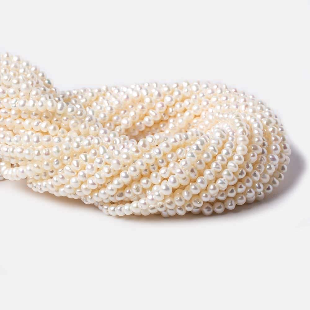 4mm Off White side drilled Baroque Freshwater Pearls 16 inch 122 pieces - Beadsofcambay.com