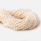 4x5.5-4.5x7mm Off White straight drilled Oval freshwater pearls 15.5 inch 65 pieces A - Beadsofcambay.com