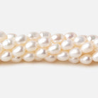 4x5.5-4.5x7mm Off White straight drilled Oval freshwater pearls 15.5 inch 65 pieces A - Beadsofcambay.com