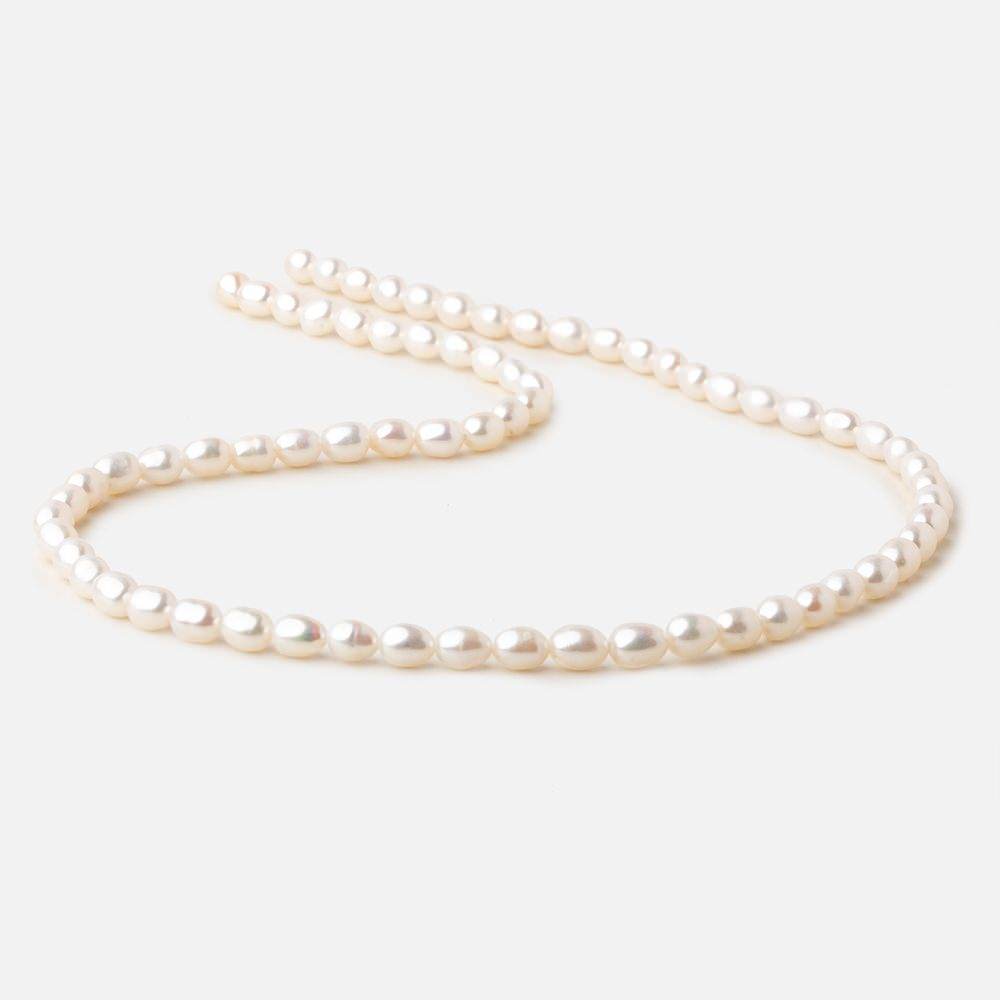 4x5.5-4.5x7mm Off White straight drilled Oval freshwater pearls 15.5 inch 65 pieces A - Beadsofcambay.com