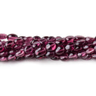 5-6mm Malaia Garnet Plain Oval Beads 16 inch 72 pieces AA - Beadsofcambay.com