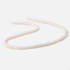 5-6mm Off White Center Drilled Button Freshwater Pearls 16 inch 144 pieces - Beadsofcambay.com