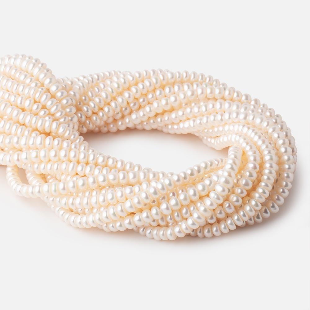5-6mm Off White Center Drilled Button Freshwater Pearls 16 inch 144 pieces - Beadsofcambay.com
