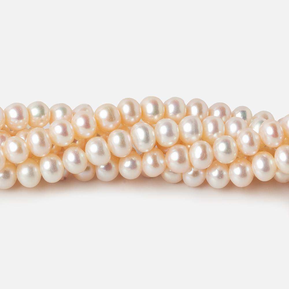 5.5x4mm Cream Side Drilled Off Round Freshwater Pearls 15 inch 85 pieces - Beadsofcambay.com