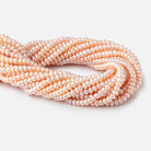5.5mm Peach Button Freshwater Pearl Beads 15.5 inch 106 pieces - Beadsofcambay.com