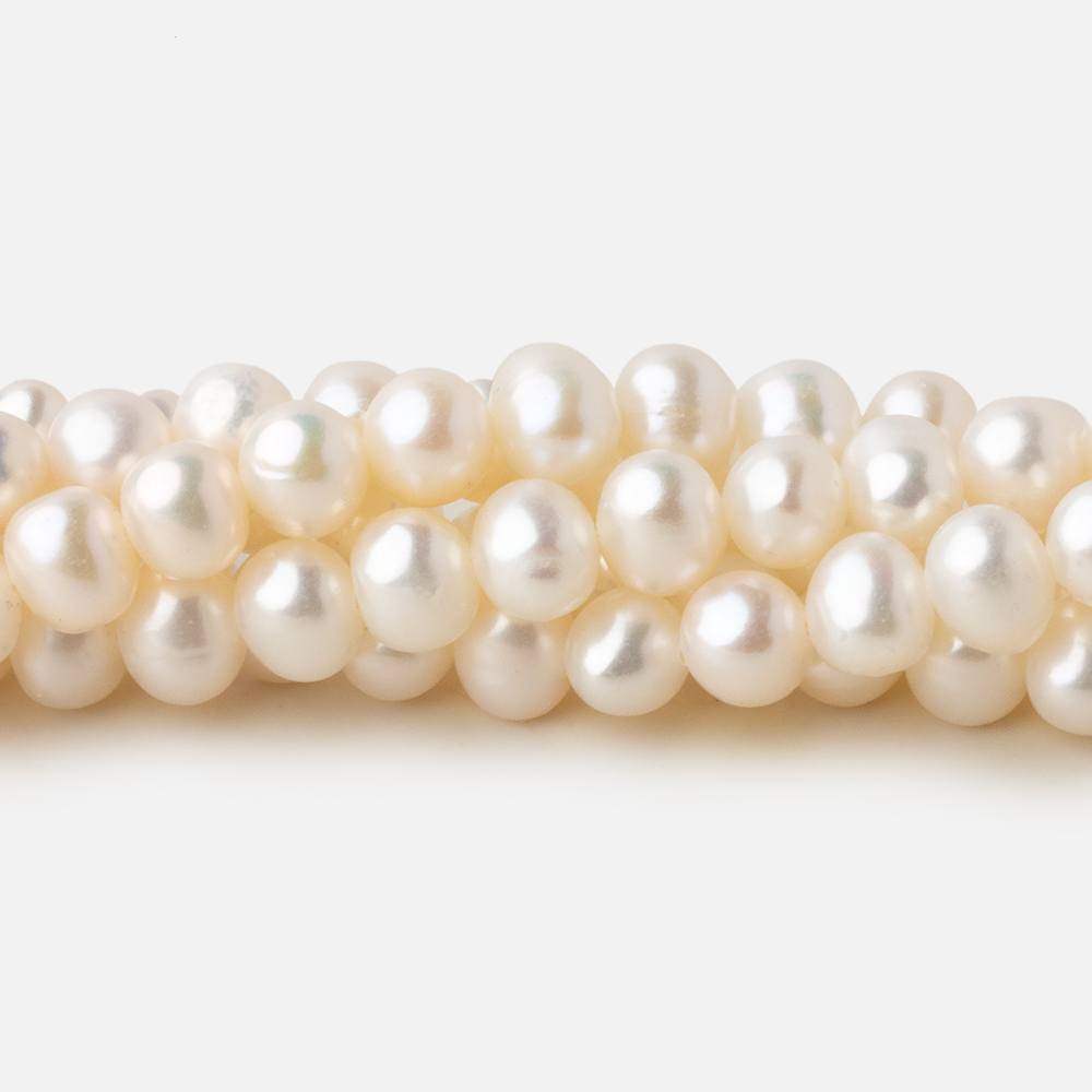 5.5x5-6x4.5mm Off White side drilled Oval freshwater pearls 15 inch 78 pieces A - Beadsofcambay.com