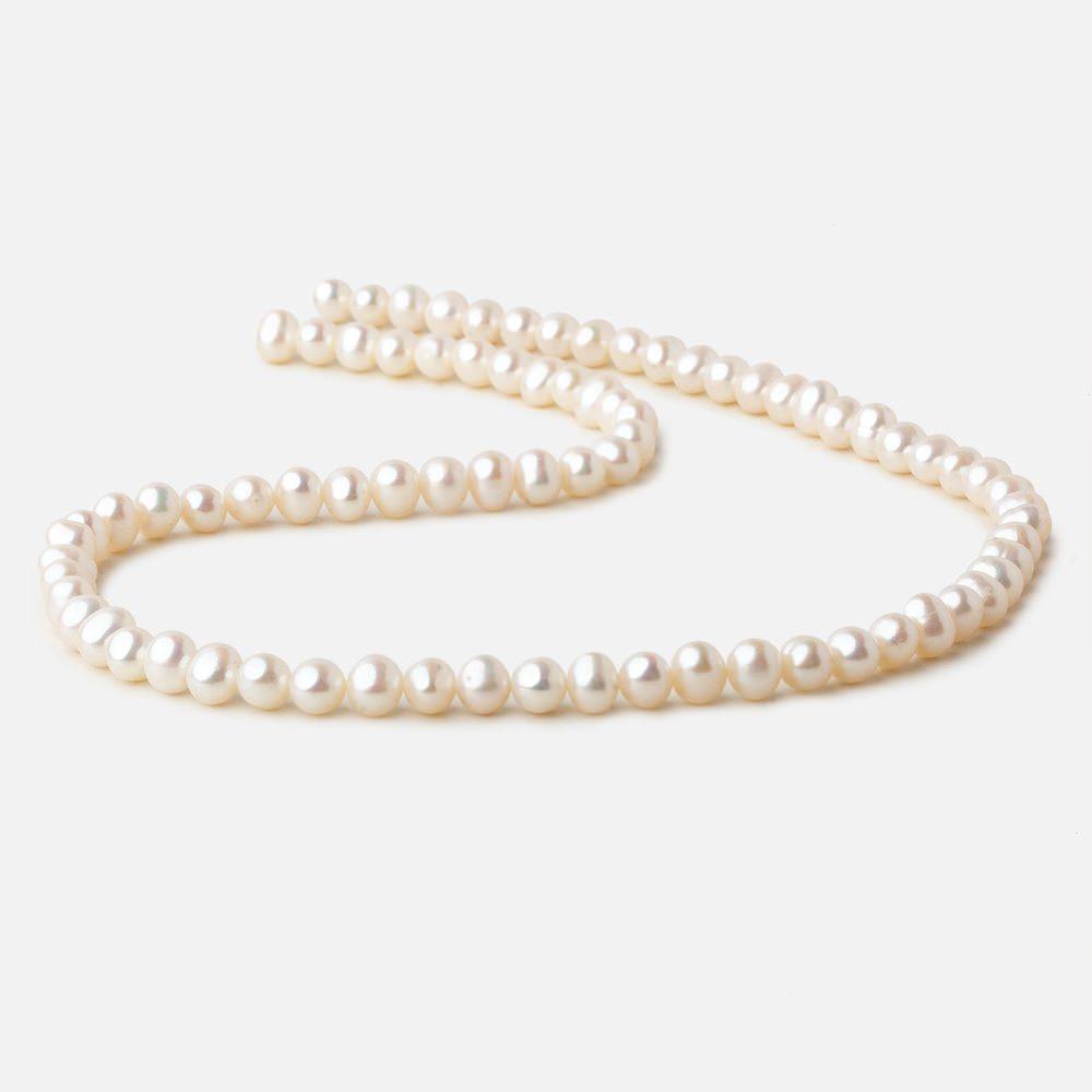 5.5x5-6x4.5mm Off White side drilled Oval freshwater pearls 15 inch 78 pieces A - Beadsofcambay.com