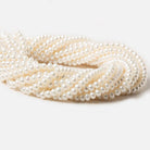 5mm Off White Center Drilled Button Freshwater Pearls 15.5 inch 100 pieces - Beadsofcambay.com