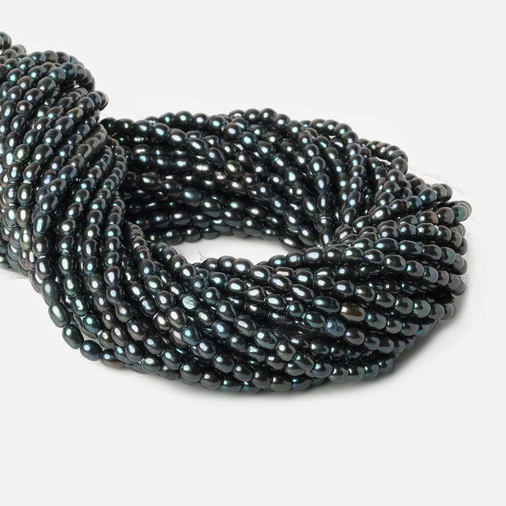 5x4-6x4mm Blue Peacock Large Hole Oval Freshwater Pearls 1.5mm drill hole 15 inch 64 pcs - Beadsofcambay.com