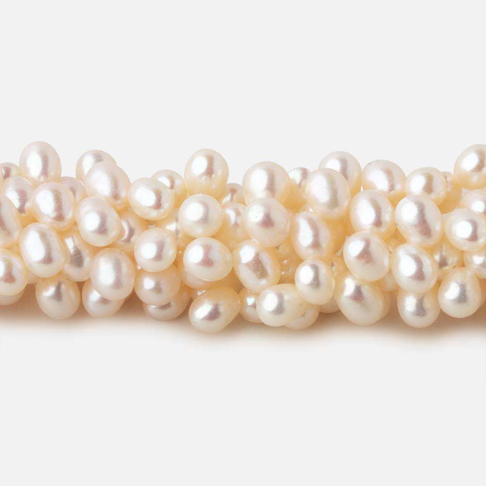 5x4-6x4mm Off White top drilled Oval freshwater pearls 15.5 inch 133 pieces A - Beadsofcambay.com
