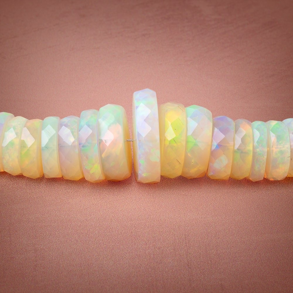 6-13.5mm Ethiopian Opal Faceted Heshi Beads 16 inch 182 pieces AAA - Beadsofcambay.com