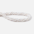 6-6.5mm Silvery White Oval Freshwater Pearls 16.5 inch 65 Beads - Beadsofcambay.com