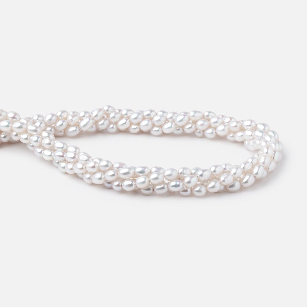 6-6.5mm Silvery White Oval Freshwater Pearls 16.5 inch 65 Beads - Beadsofcambay.com