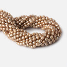 6-7mm Buttery Golden straight drilled oval pearls 15.5 inch 60 pieces - Beadsofcambay.com