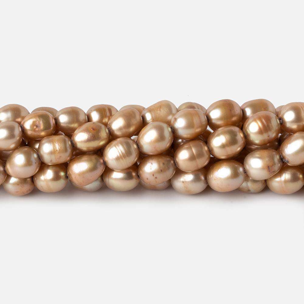 6-7mm Buttery Golden straight drilled oval pearls 15.5 inch 60 pieces - Beadsofcambay.com