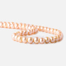 6-7mm Creamsicle Large Hole Off Round Freshwater Pearl 2.5mm drill hole, 15 inch, 75 pieces - Beadsofcambay.com