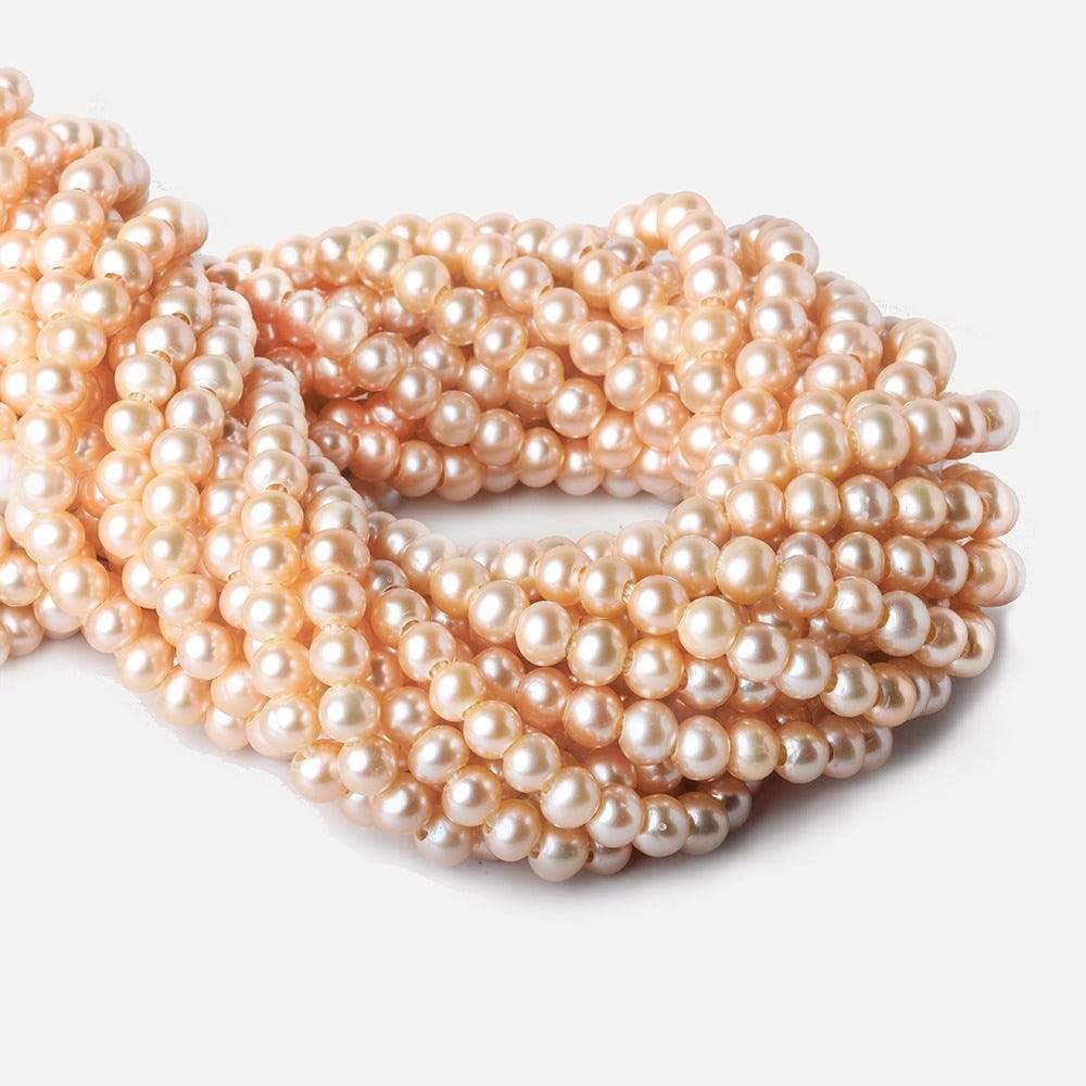 6-7mm Creamsicle Large Hole Off Round Freshwater Pearl 2.5mm drill hole, 15 inch, 75 pieces - Beadsofcambay.com