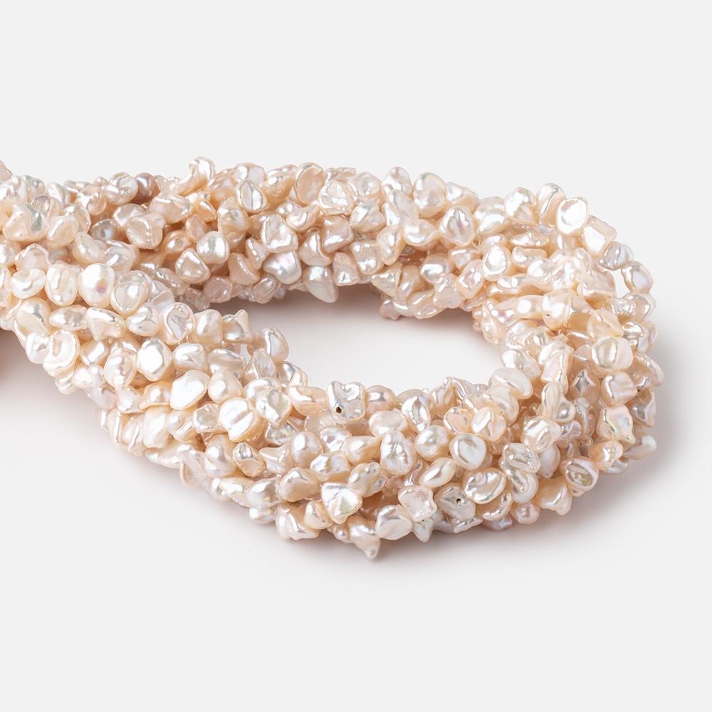 6-7mm Light Peach Side Drilled Keshi Freshwater Pearls 15.5 inch 70 pieces - Beadsofcambay.com