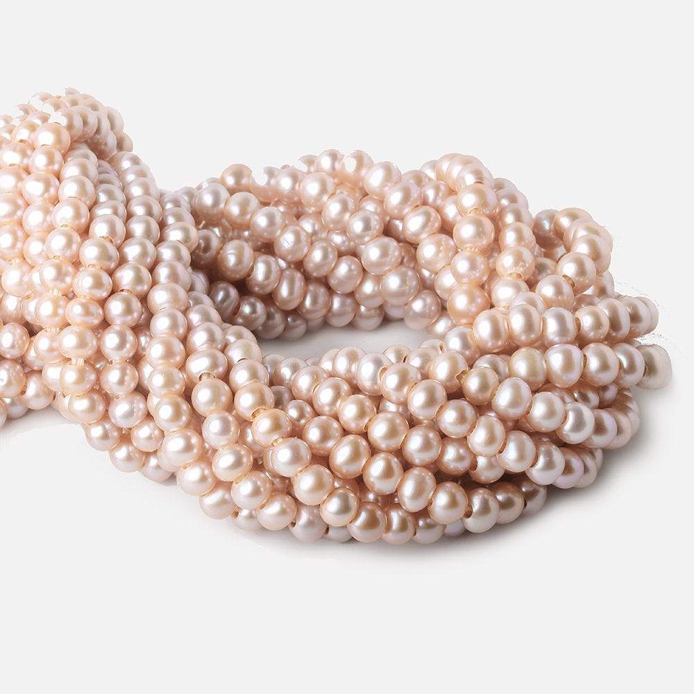 6-7mm Pink Ice Large Hole Off Round Freshwater Pearl 2.5mm drill hole, 15 inch, 75 pieces - Beadsofcambay.com