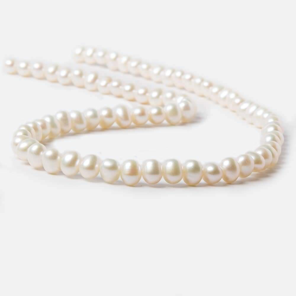 6.5x5-7x5.5mm Cream Side Drilled Oval Freshwater Pearls 16 inch 74 pieces - Beadsofcambay.com