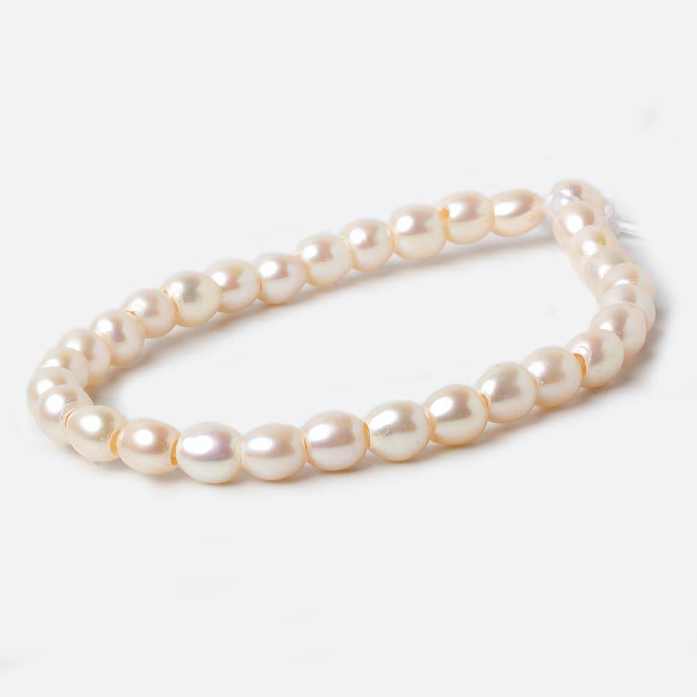 6.5x6.5mm Creamy White Straight Drilled Oval Large Hole pearls 8 inch 30 pieces AA - Beadsofcambay.com