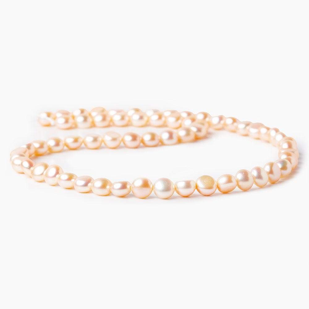 6mm Peach Button Freshwater Pearls 16 inch 65 pcs - Beadsofcambay.com