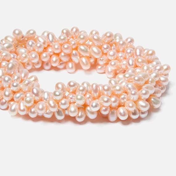 6x4-7x5mm Peach Top Drilled Oval Freshwater Pearls 15.5 inch 90 pcs - Beadsofcambay.com