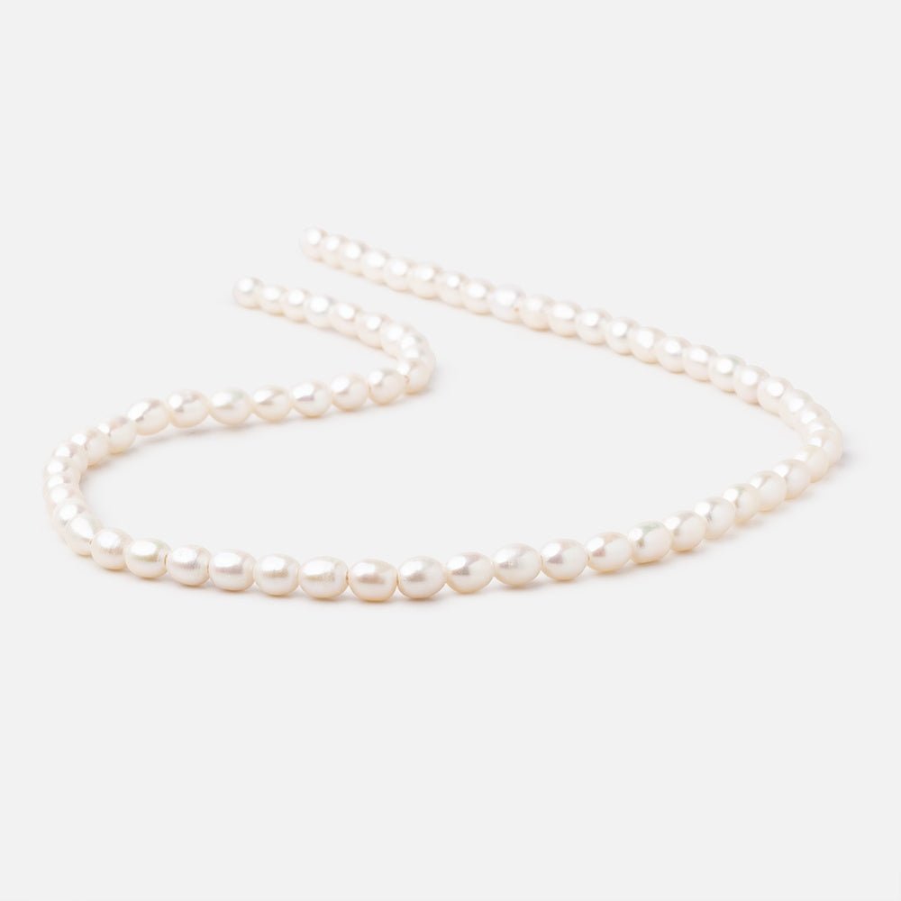 6x4.5mm Off White Oval 1.5mm Drill Hole Freshwater Pearls 61 pieces - Beadsofcambay.com